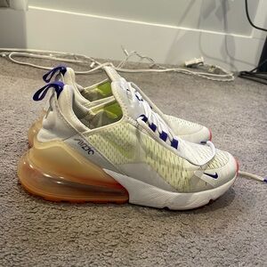 Nike sneakers worn but in good condition